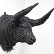 Image for article titled This Artist Turns Old Tires Into Dark, Disturbing Nightmare Monsters